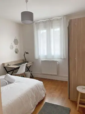 Un ou plusieurs lits dans un hébergement de l'établissement Appartement T4 charmant bien situé, Charpennes