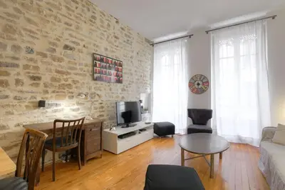 Coin salon dans l'établissement Bel appartement spacieux, climatisé - Lyon centre
