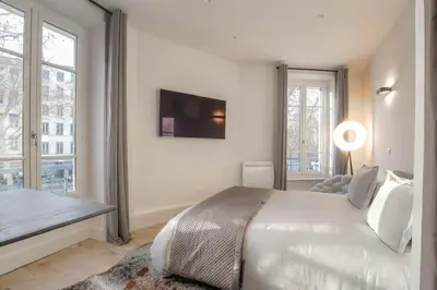 Un ou plusieurs lits dans un hébergement de l'établissement Superbe studio, Tête d'or, Lyon