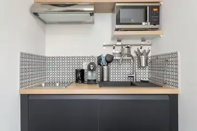 Cuisine ou kitchenette dans l'établissement Mazzini, centre historique et climatisé, Lyon 1er