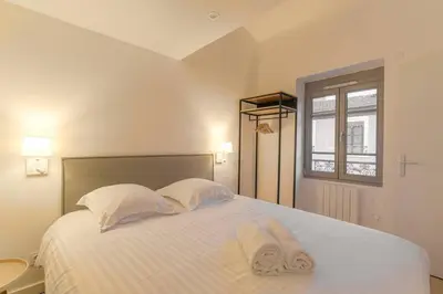 Un ou plusieurs lits dans un hébergement de l'établissement Joli T2 avec mezzanine, secteur gare, Lyon 3 - rue Baraban
