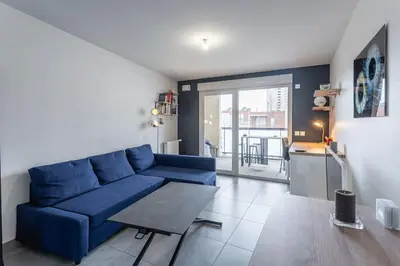 Coin salon dans l'établissement Appartement bien équipé avec parking, Lyon 8