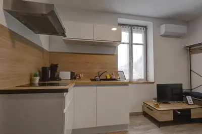 Cuisine ou kitchenette dans l'établissement Le Westy 2