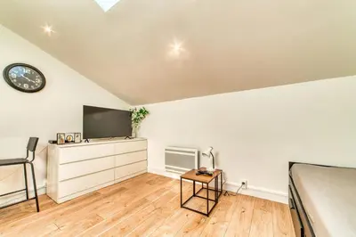 Télévision ou salle de divertissement dans l'établissement Le Nid Blanc - Agréable studio tout équipé