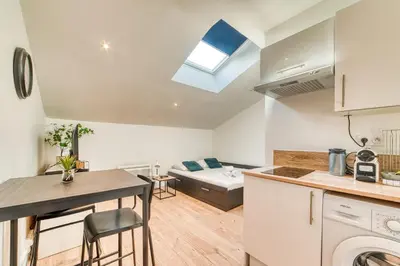 Cuisine ou kitchenette dans l'établissement Le Nid Blanc - Agréable studio tout équipé