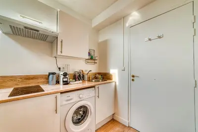 Cuisine ou kitchenette dans l'établissement Le Nid Blanc - Agréable studio tout équipé