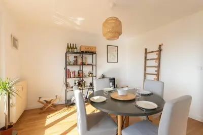 Coin salon dans l'établissement Grand Appartement Cosy - Parking & Balcon