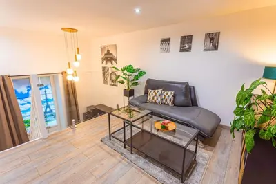 Coin salon dans l'établissement Le Paris - Proche Gare Chateaucreux-