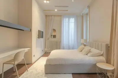 Un ou plusieurs lits dans un hébergement de l'établissement Appartement spacieux et lumineux pour 8, Lyon 1er
