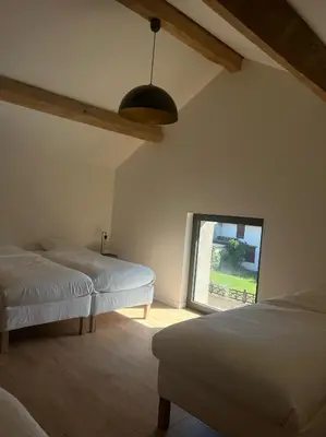 Un ou plusieurs lits dans un hébergement de l'établissement Gîte de Condeiss