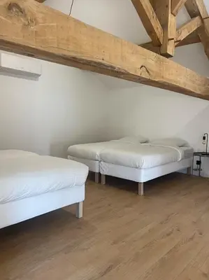 Un ou plusieurs lits dans un hébergement de l'établissement Gîte de Condeiss