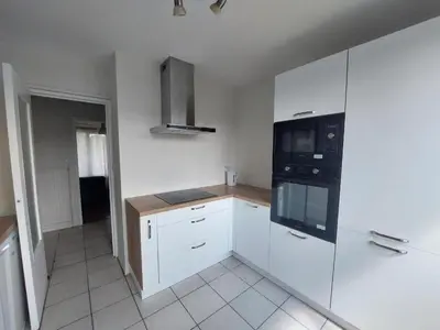 Cuisine ou kitchenette dans l'établissement Charmant T3 dans résidence