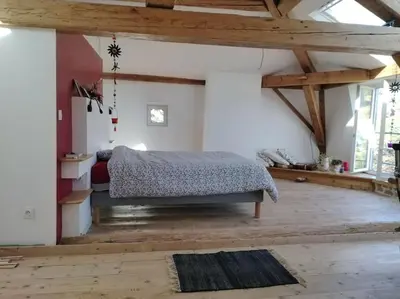 Un ou plusieurs lits dans un hébergement de l'établissement Maison de charme très spacieuse