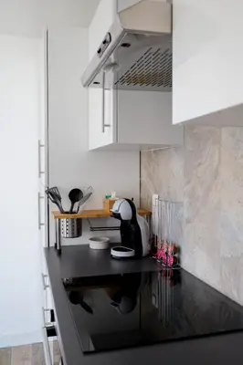 Cuisine ou kitchenette dans l'établissement Le Studio Cosy