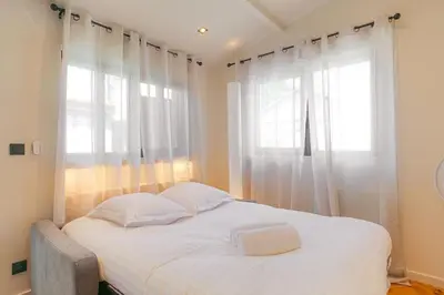 Un ou plusieurs lits dans un hébergement de l'établissement Appartement lumineux pour 4, Villeurbanne Cusset