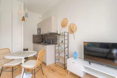 Cuisine ou kitchenette dans l'établissement T2 neuf, climatisé proche Lyon
