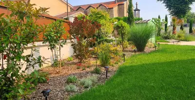 Jardin de l'établissement Les chambres de la Dombes