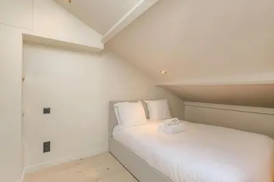 Un ou plusieurs lits dans un hébergement de l'établissement T3 spacieux en duplex, 2 chambres, Villeurbanne
