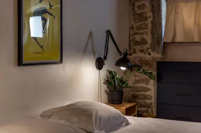 Un ou plusieurs lits dans un hébergement de l'établissement All in Lyon | Duplex des Pentes de la Croix-Rousse