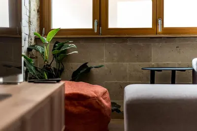 Coin salon dans l'établissement All in Lyon | Duplex des Pentes de la Croix-Rousse