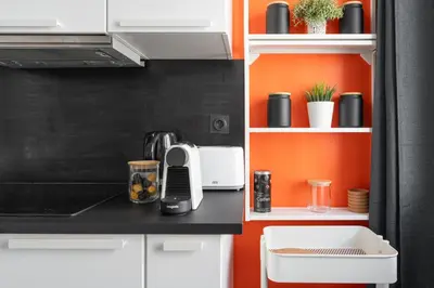 Cuisine ou kitchenette dans l'établissement L'Amharique - À Lyon, 5min de la gare Part-Dieu