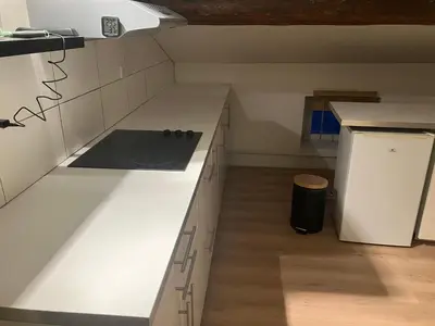 Cuisine ou kitchenette dans l'établissement La Tour Ronde