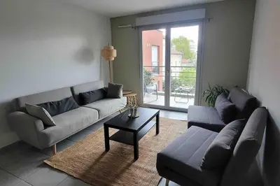 Coin salon dans l'établissement Un balcon à Monplaisir- 4 lits -garage - 47m2
