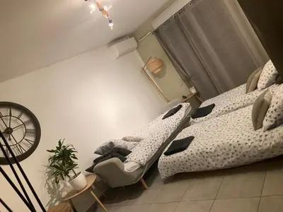 Un ou plusieurs lits dans un hébergement de l'établissement Un balcon à Monplaisir- 4 lits -garage - 47m2