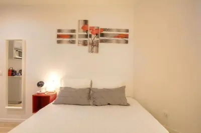 Un ou plusieurs lits dans un hébergement de l'établissement Studio chaleureux - Proche Presqu'île de Lyon