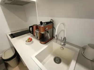 Cuisine ou kitchenette dans l'établissement 'La forêt enchantée'