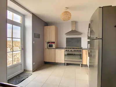 Cuisine ou kitchenette dans l'établissement Les Caboches de Garanche
