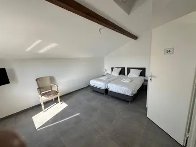 Un ou plusieurs lits dans un hébergement de l'établissement House with 5 bedrooms lechaffardcom