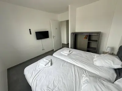 Un ou plusieurs lits dans un hébergement de l'établissement House 60 with 3 bedrooms lechaffardcom