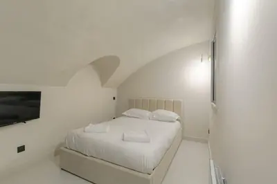 Un ou plusieurs lits dans un hébergement de l'établissement Superbe duplex avec parking, Tour-de-Salvagny