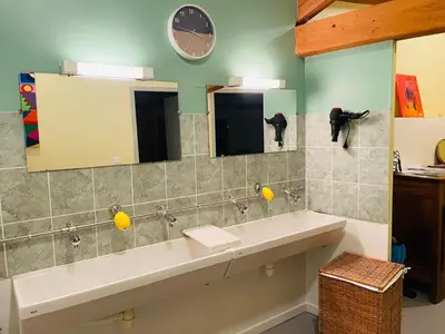 Salle de bains dans l'établissement Les terres du Sotison