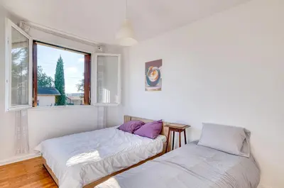 Un ou plusieurs lits dans un hébergement de l'établissement Le Repaire des Travailleurs - Balcon Privé - Jonage