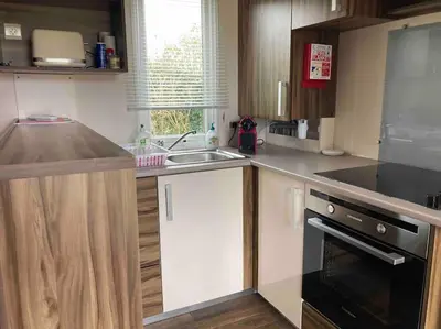 Cuisine ou kitchenette dans l'établissement Nuit ou week end nature 6 pers TT équipé