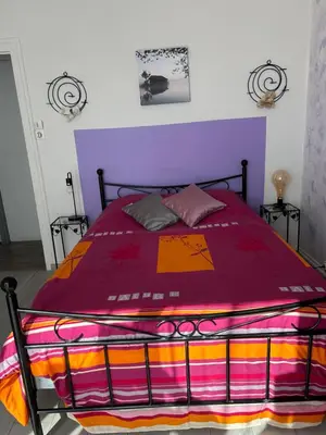 Un ou plusieurs lits dans un hébergement de l'établissement chambres hôtes les grenouilles