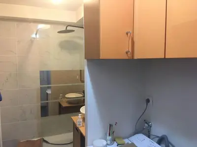 Salle de bains dans l'établissement Appartement en Rez de jardin climatisée 2 pièces-cuisine avec terrasse et jardin