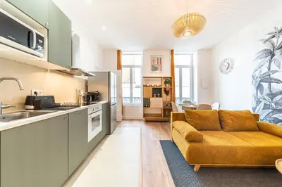 Cuisine ou kitchenette dans l'établissement Le Marietton appartement cosy à deux pas du métro Valmy