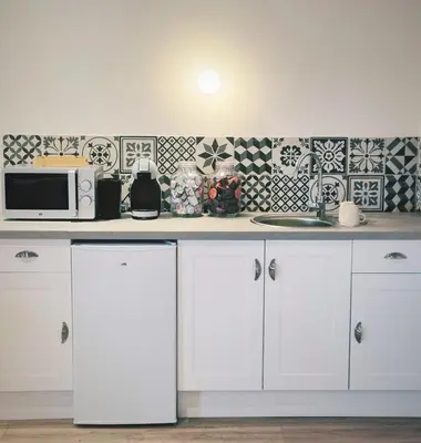 Cuisine ou kitchenette dans l'établissement Art et cosy