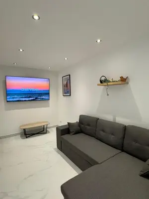 Coin salon dans l'établissement Appartement Dauphiné - près de la Gare