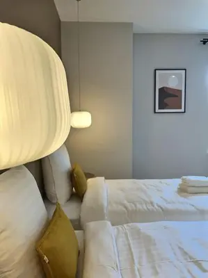 Un ou plusieurs lits dans un hébergement de l'établissement La maison de Vincent de Miss K