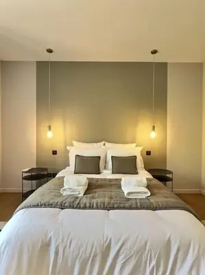 Un ou plusieurs lits dans un hébergement de l'établissement La maison de Vincent de Miss K