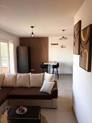 Coin salon dans l'établissement Appartement moderne avec terrasse Vue dégagée
