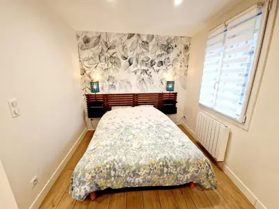 Un ou plusieurs lits dans un hébergement de l'établissement Studio Calme & Connecté Près de Lyon
