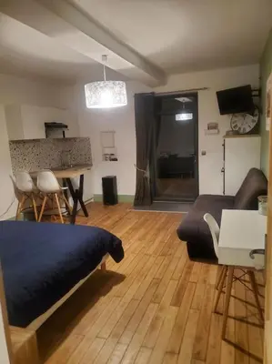 Coin salon dans l'établissement Le courpata