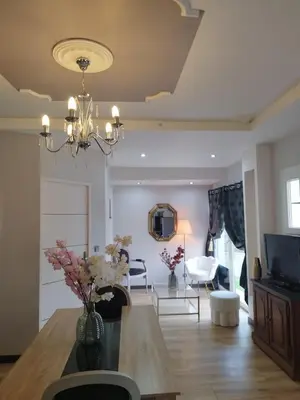 Coin salon dans l'établissement Appartement dans Villa Borghese