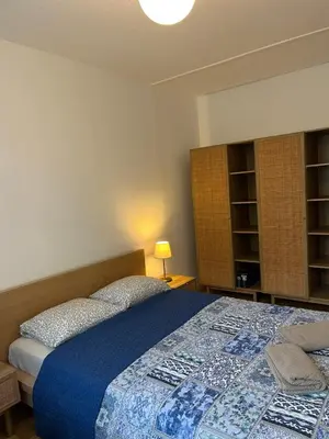 Un ou plusieurs lits dans un hébergement de l'établissement Appartement T3 Lyon centre