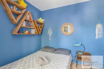 Un ou plusieurs lits dans un hébergement de l'établissement Maison à Lyon Parilly avec Piscine, Jardin, Parking Privé & Proche Eurexpo